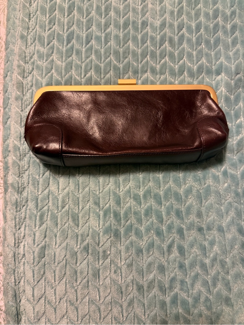 latico black leather clutch with gold frame